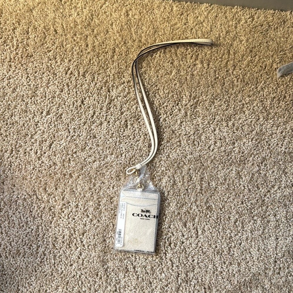 Brand new Coach lanyard ID